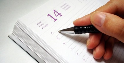 TRE-AP Mão escrevendo em agenda
