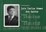 Foto de busto preta e branca do Desembargador Luiz Carlos Gomes dos Santos usando toga e gravata.